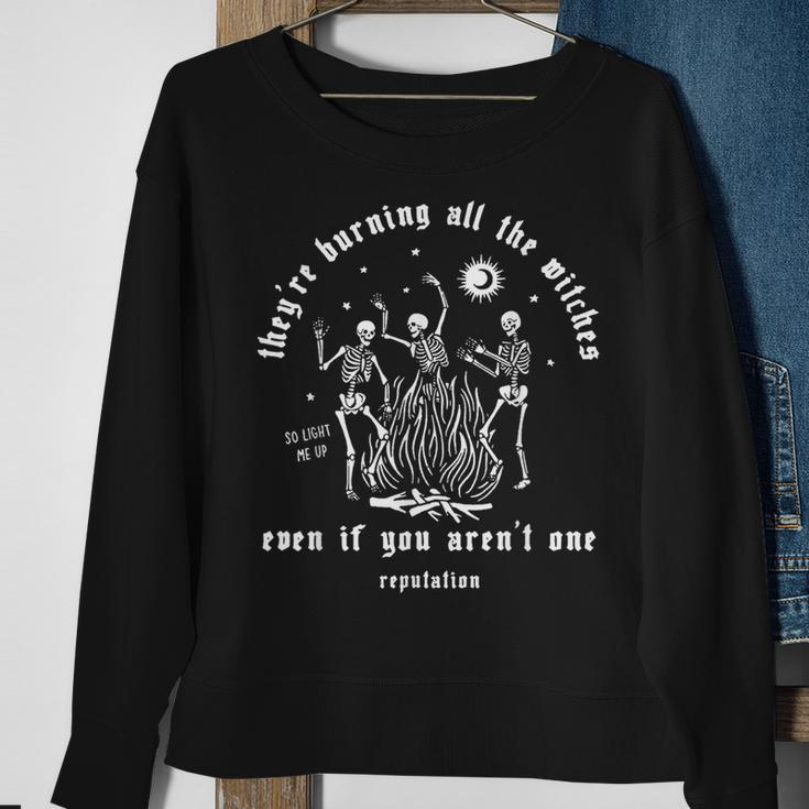 They're Burning All The Witches Halloween Skeleton Dancing Sweatshirt Gifts for Old Women
