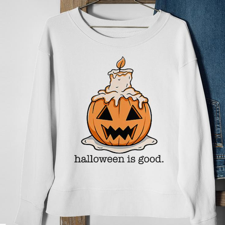 Halloween Is Good And Life Spooky Pumpkin Candle Halloween Sweatshirt Gifts for Old Women