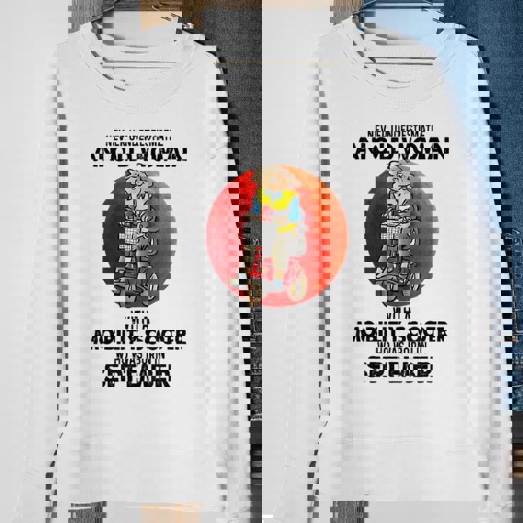 Never Underestimate An Old Woman Mobility Scooter September Old Woman Funny Gifts Sweatshirt Gifts for Old Women