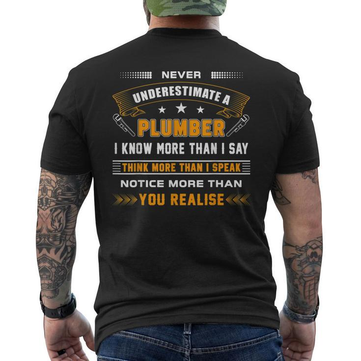 Never Underestimate A Plumber Apparel For Plumbers Men's T-shirt Back Print