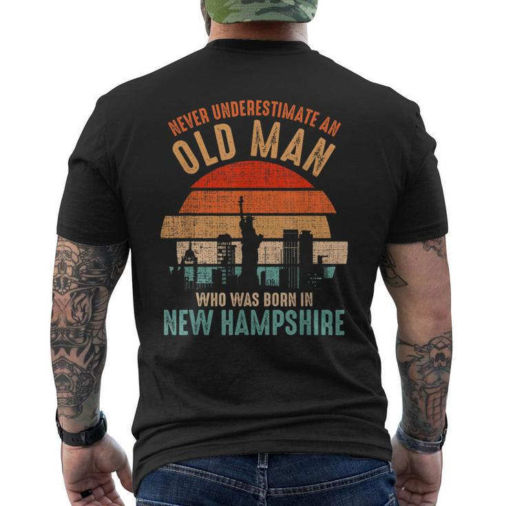 Mb Never Underestimate An Old Man Born In New Hampshire Men's T-shirt Back Print