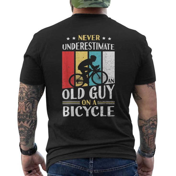 Never Underestimate An Old Guy On A Bicycle Bike Cyclist Mens Back Print T-shirt