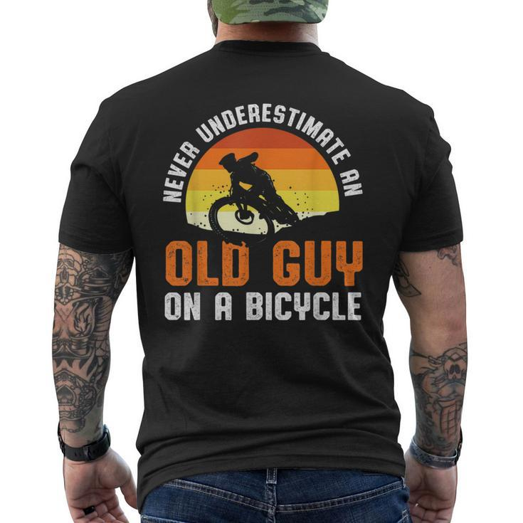 Never Underestimate An Old Guy On A Bicycle Funny Riders Dad Mens Back Print T-shirt