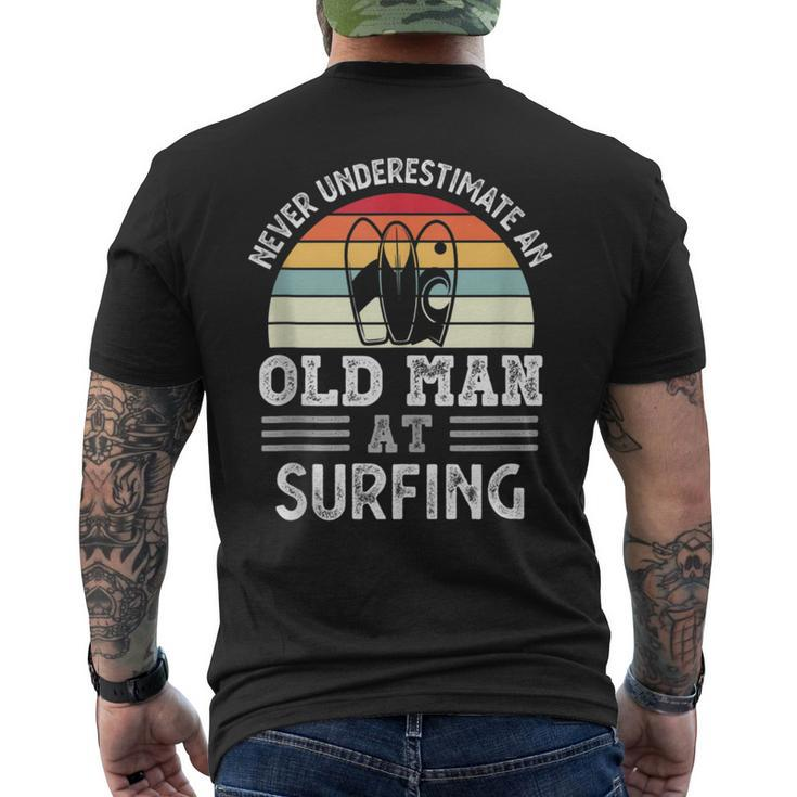 Never Underestimate An Old Man At Surfing Fathers Day Gift For Mens Mens Back Print T-shirt