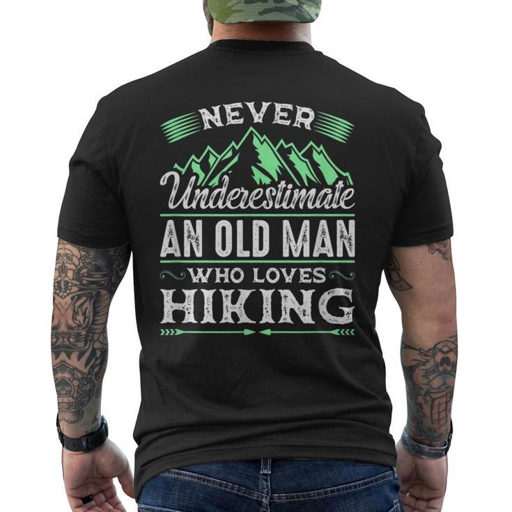 Never Underestimate An Old Man Who Loves Hiking Gift For Mens Mens Back Print T-shirt