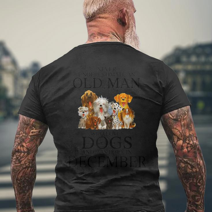 Never Underestimate An Old Man Who Loves Dogs In December Men's T-shirt Back Print Gifts for Old Men