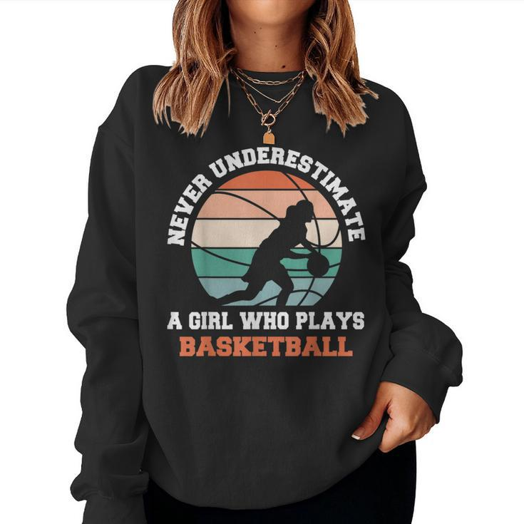 Never Underestimate A Girl Who Plays Basketball Women Sweatshirt