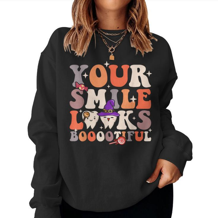 Your Smile Looks Bootiful Dentist Halloween Spooky Groovy Women Sweatshirt