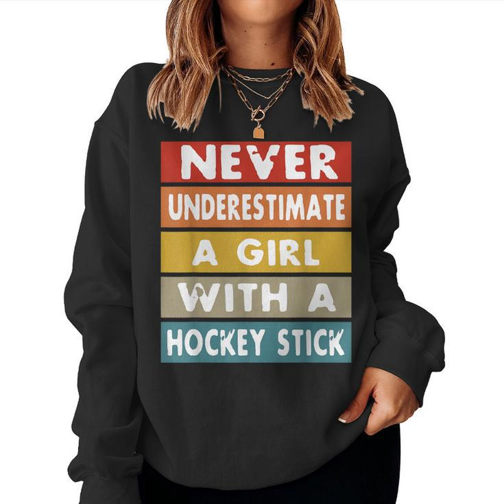 Never Underestimate A Girl With A Hockey Stick Women Sweatshirt