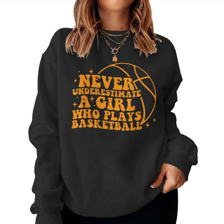 Never Underestimate A Girl Who Plays Basketball Groovy Women Sweatshirt