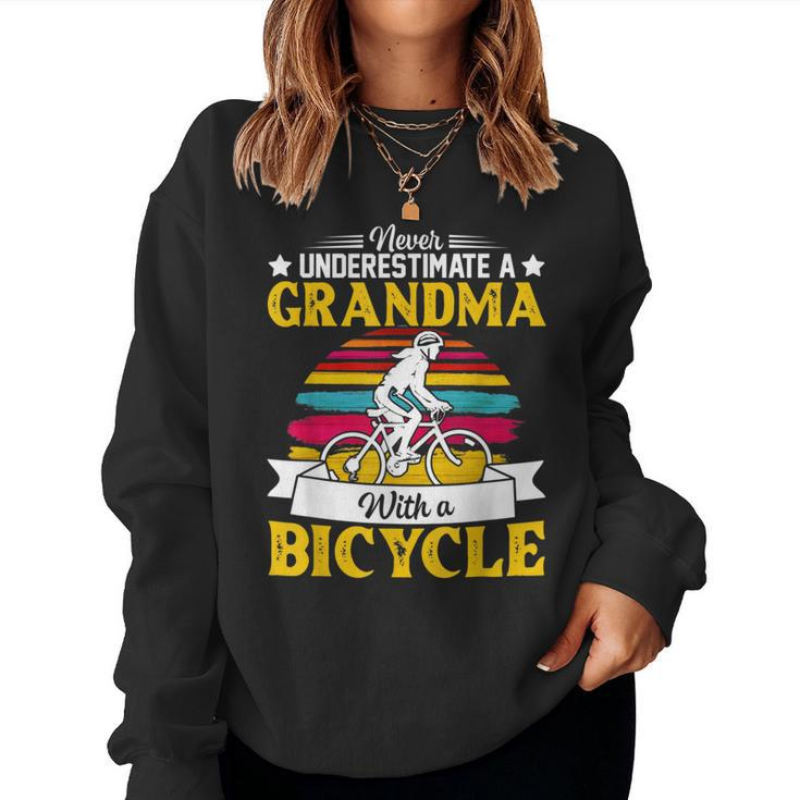 Never Underestimate A Grandma With A Bicycle Vintage Women Sweatshirt