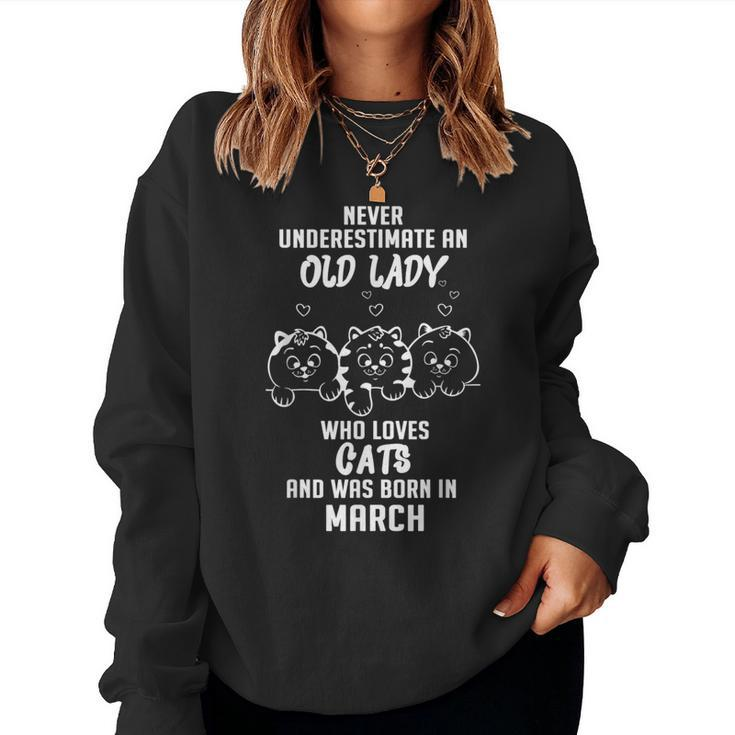 Never Underestimate An Old Lady Who Loves Cats Born In March Women Sweatshirt