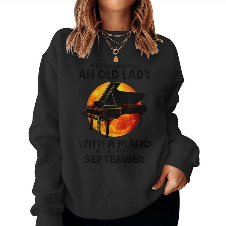 Never Underestimate An Old Lady With A Piano Born September Women Sweatshirt