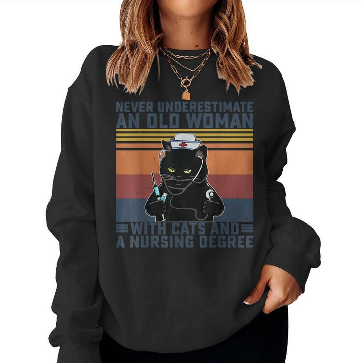 Never Underestimate An Old Woman With Cats & A Nursing Degre Women Sweatshirt