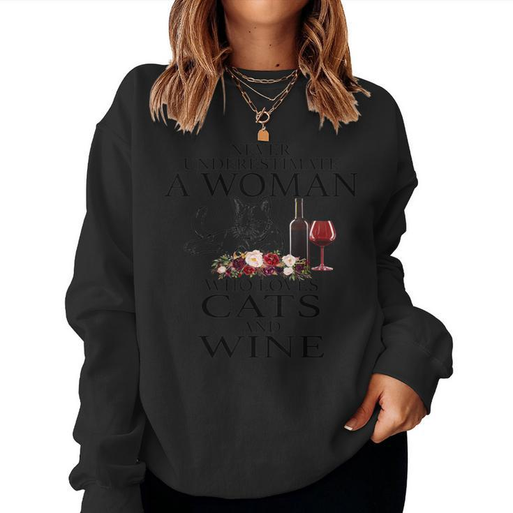 Never Underestimate A Woman Who Loves Cats And Wine Women Sweatshirt