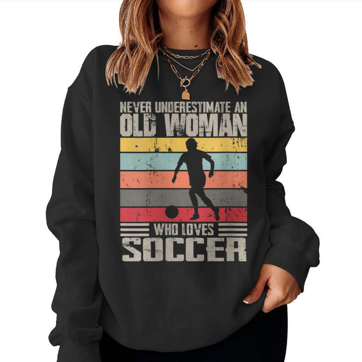 Vintage Never Underestimate An Old Woman Who Loves Soccer Women Sweatshirt