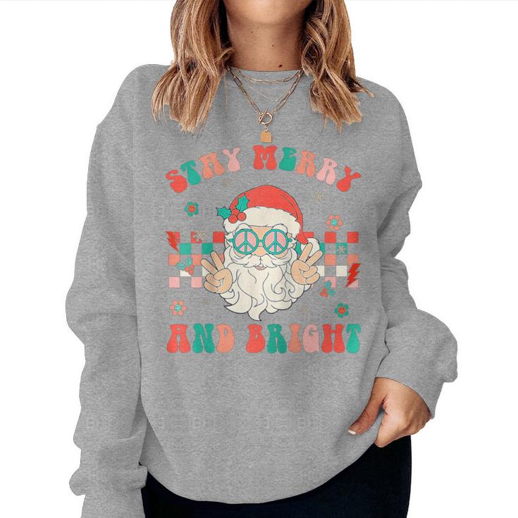 https://i3.cloudfable.net/styles/735x735/591.289/Sports_Grey/retro-groovy-stay-merry-bright-santa-claus-christmas-women-sweatshirt-20231011080613-0vsdp0bc.jpg