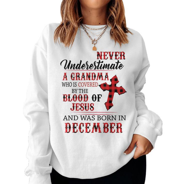 December Never Underestimate A Grandma Covered By The Blood Women Sweatshirt