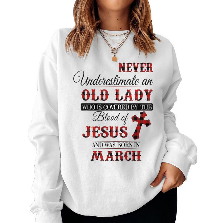 Never Underestimate An Old Lady Love Jesus Born In March Women Crewneck Graphic Sweatshirt