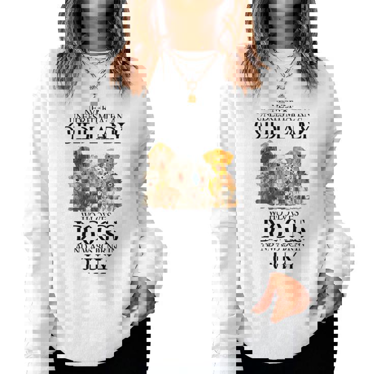 Never Underestimate An Old Lady Who Loves Dogs Born July Women Crewneck Graphic Sweatshirt