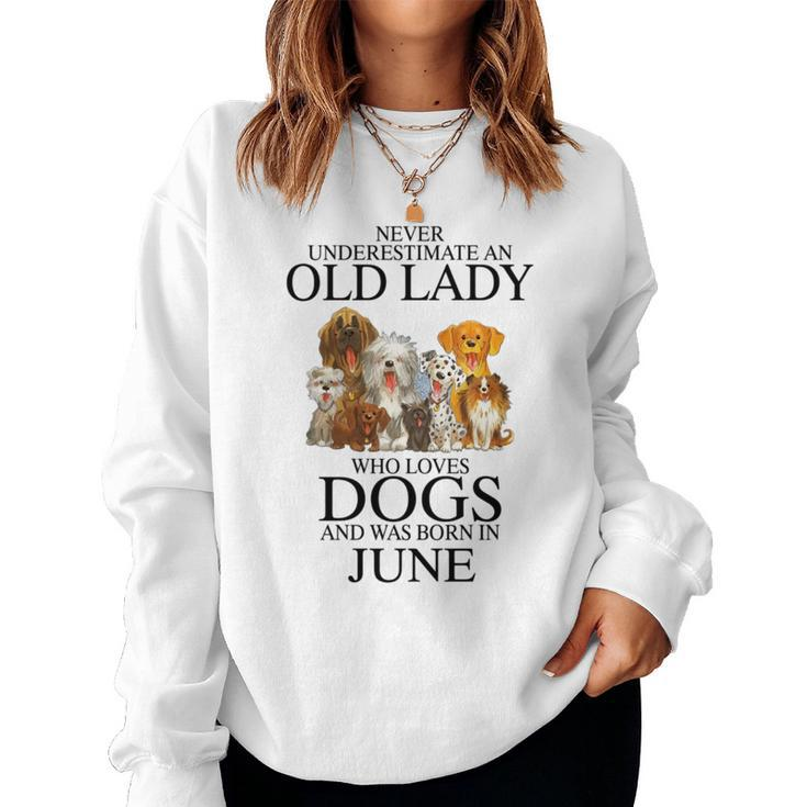 Never Underestimate An Old Lady Who Loves Dogs Born June Women Crewneck Graphic Sweatshirt