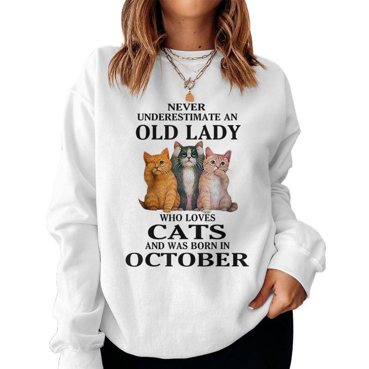 Never Underestimate An Old Lady Who Loves Cats Born October Women Sweatshirt