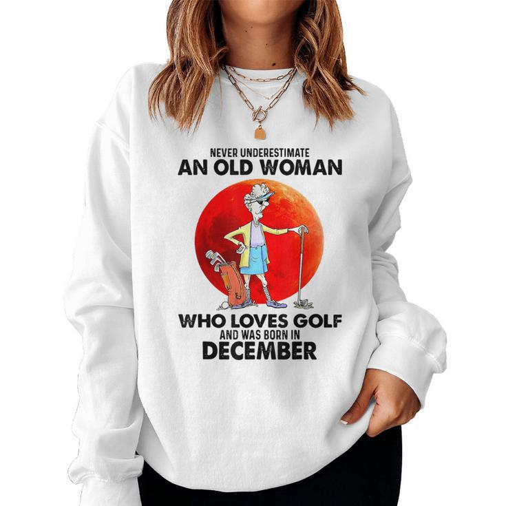 Never Underestimate An Old Woman Who Loves Golfs December Women Sweatshirt