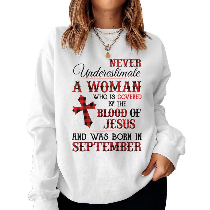 A Woman Covered The Blood Of Jesus And Was Born In September Women Sweatshirt