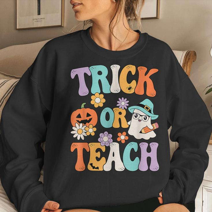 Groovy Halloween Trick Or Teach Retro Pumpkin Ghost Teacher Women Sweatshirt Gifts for Her