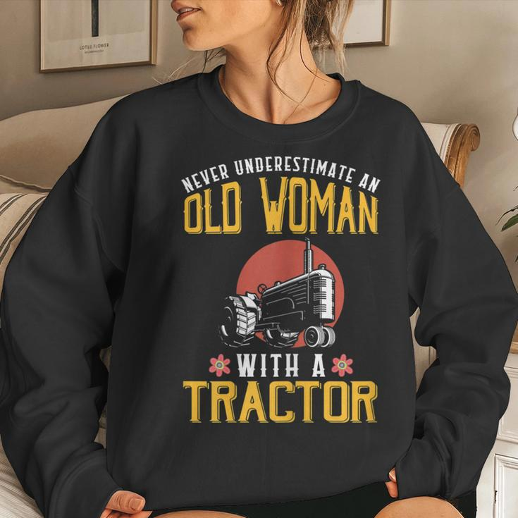 Never Underestimate An Old Woman With A Tractor Women Sweatshirt Gifts for Her