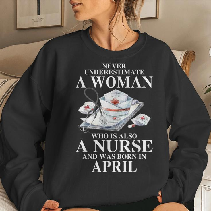 Never Underestimate A Woman Who Is Also A Nurse Born April Women Sweatshirt Gifts for Her