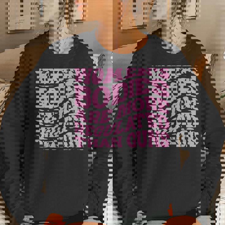 Womens Bodies Are More Regulated Than Guns Pro-Choice Women Crewneck Graphic Sweatshirt Gifts for Her Womens Bodies Are More Regulated Than Guns Pro-Choice Women Crewneck Graphic Sweatshirt Gifts for Her