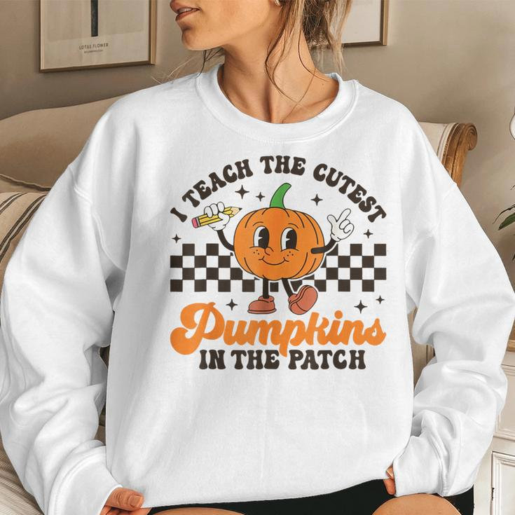I Teach The Cutest Pumpkins In The Patch Groovy Teacher Fall Women Sweatshirt Gifts for Her