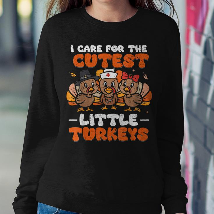 I Care For The Cutest Little Turkeys Thanksgiving Fall Nurse Women Sweatshirt Unique Gifts