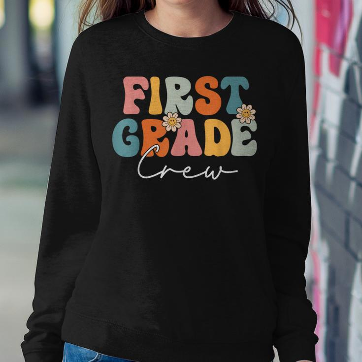 First Grade Crew Team Retro Groovy Vintage Back To School Women Sweatshirt Unique Gifts