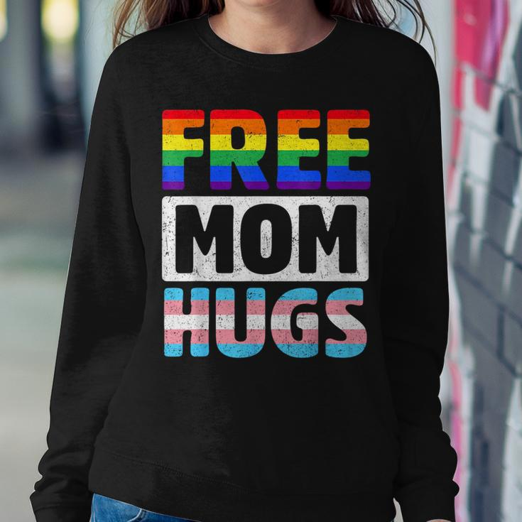 Free Mom Hugs Groovy Rainbow Heart Lgbt Flag Pride Month Women Sweatshirt Unique Gifts