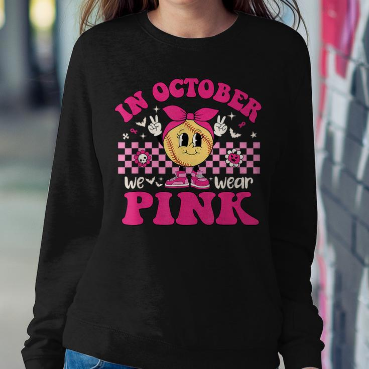 Groovy In October We Wear Pink Softball Breast Cancer Women Sweatshirt Unique Gifts