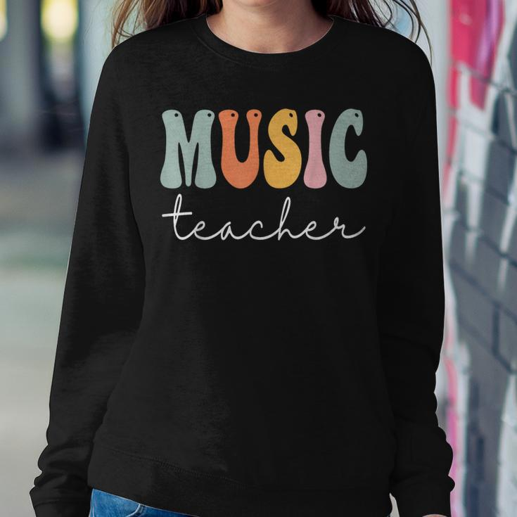 Music Teacher Retro Groovy Vintage Happy First Day Of School Women Crewneck Graphic Sweatshirt Unique Gifts