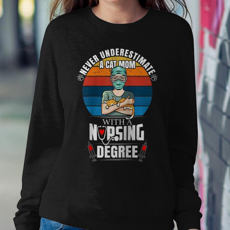 Never Underestimate A Cat Mom With A Nursing Degree Funny Women Crewneck Graphic Sweatshirt Funny Gifts