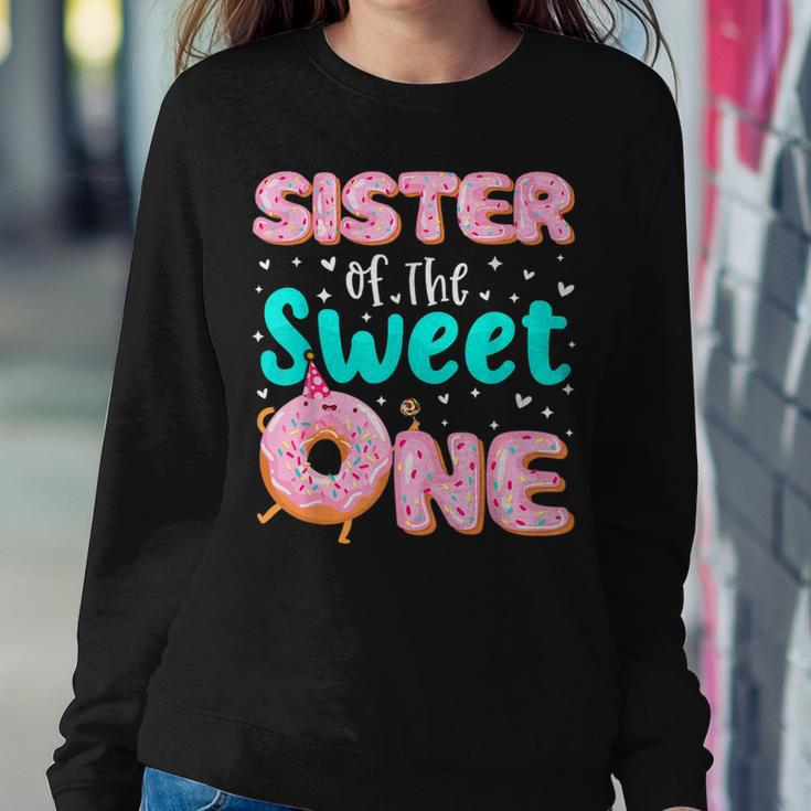 Sister Of The Sweet One 1St Birthday Donut Theme Family Women Crewneck Graphic Sweatshirt Unique Gifts