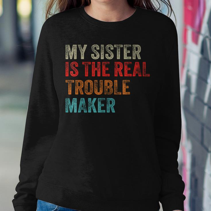 My Sister Is The Real Trouble Maker Girls Boys Groovy Women Sweatshirt Funny Gifts