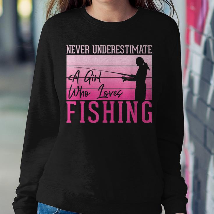 Never Underestimate A Girl Who Loves Fishing Women Sweatshirt Unique Gifts