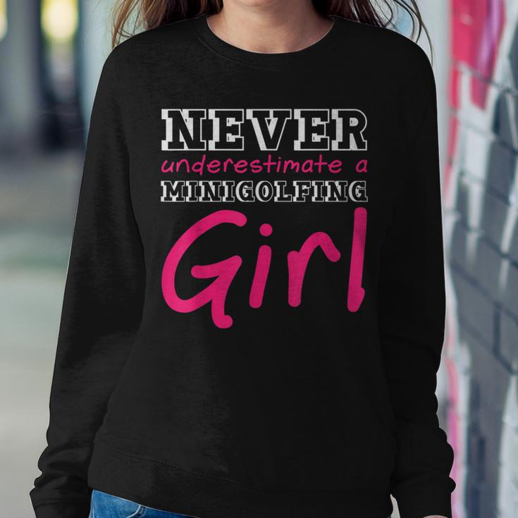Never Underestimate A Minigolfing Girl Mini Golf Golfing Women Sweatshirt Personalized Gifts