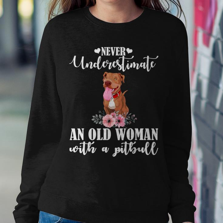 Never Underestimate An Old Woman With Pitpull Women Sweatshirt Unique Gifts