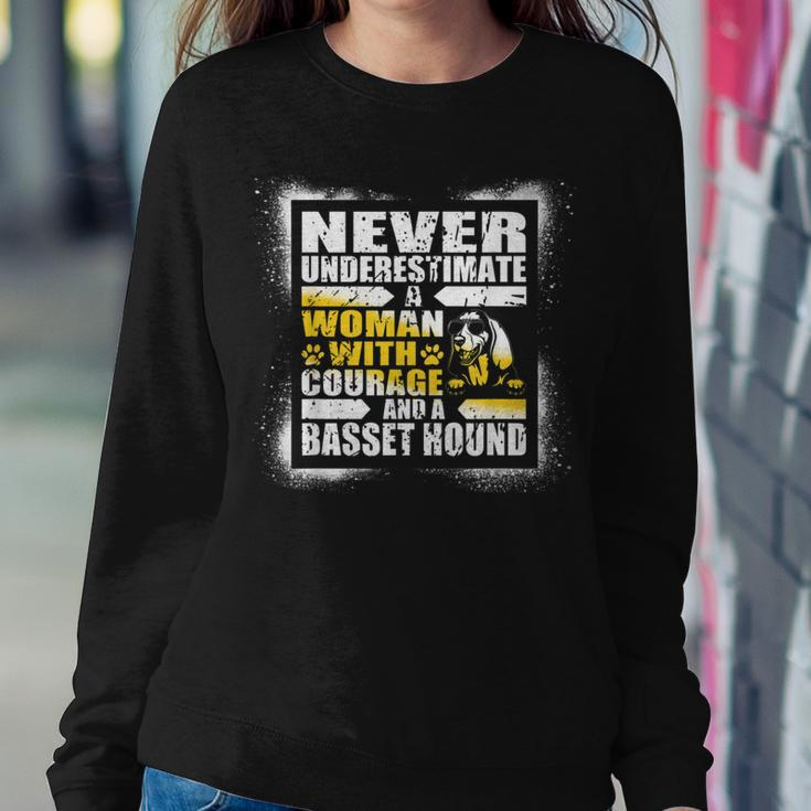 Never Underestimate Woman Courage And Her Basset Hound Women Sweatshirt Personalized Gifts