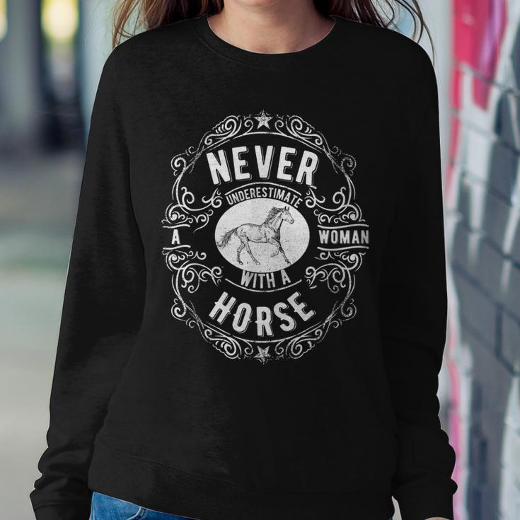 Never Underestimate A Woman With A Horse Riding Women Sweatshirt Funny Gifts