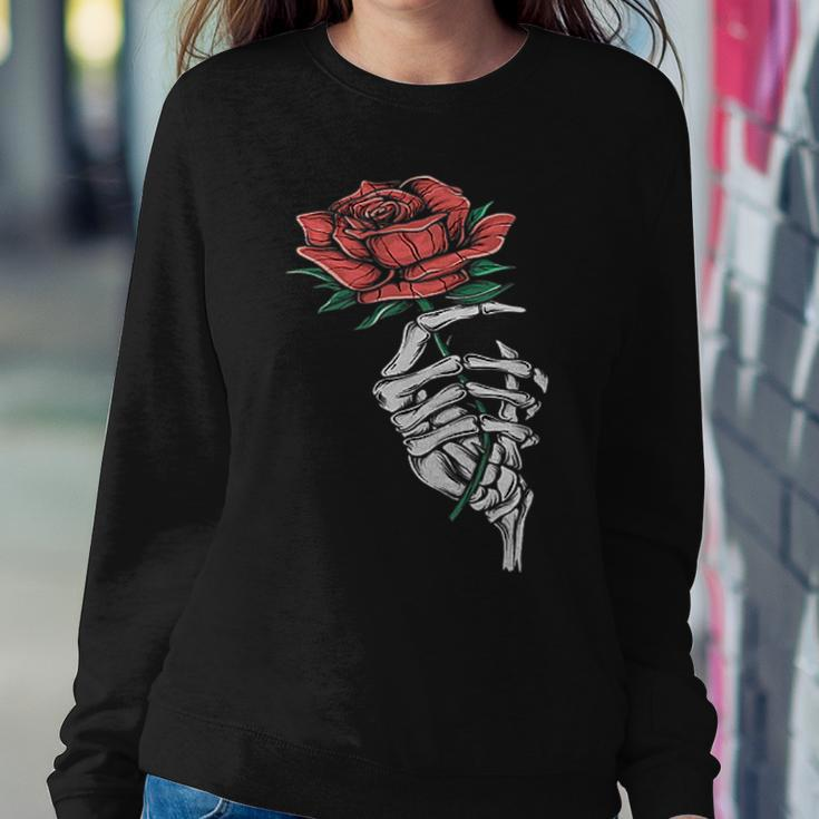 Vintage Halloween Skeleton Hand With A Rose Flower Halloween Women Sweatshirt Unique Gifts