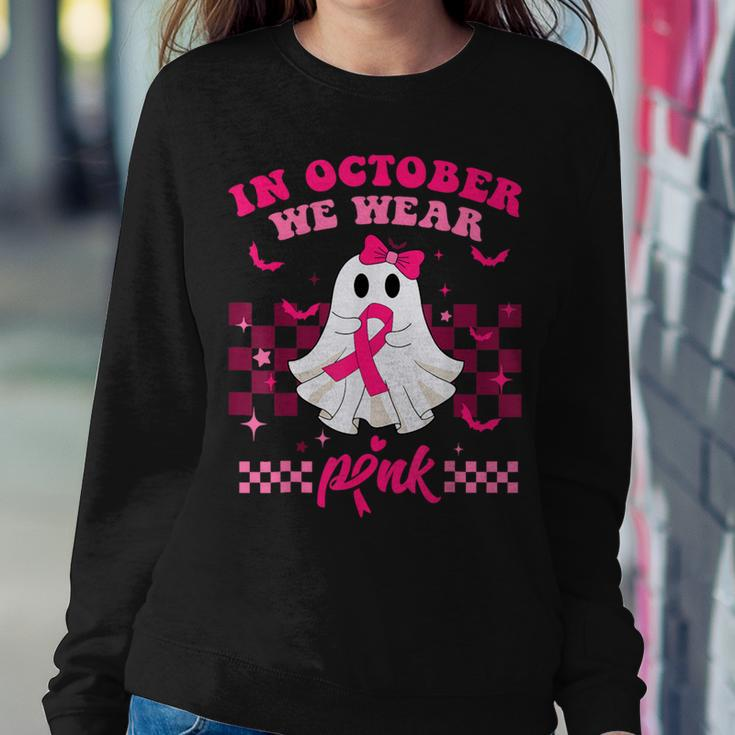 We Wear Pink Breast Cancer Awareness Ghost Halloween Groovy Women Sweatshirt Unique Gifts