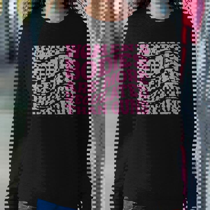 Womens Bodies Are More Regulated Than Guns Pro-Choice Women Crewneck Graphic Sweatshirt Personalized Gifts Womens Bodies Are More Regulated Than Guns Pro-Choice Women Crewneck Graphic Sweatshirt Personalized Gifts