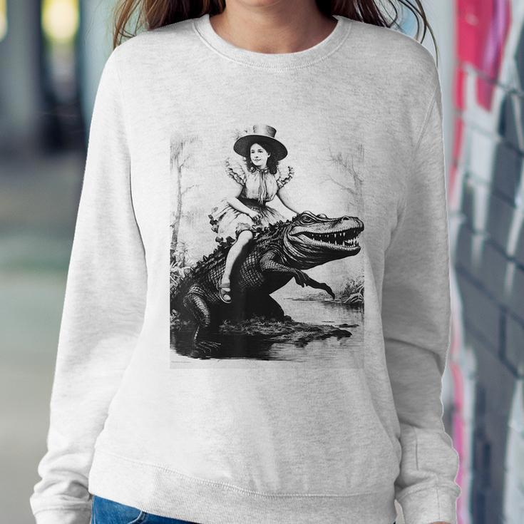 Girl Riding Alligator | Weird Funny Florida Crocodile Meme Women Crewneck Graphic Sweatshirt Personalized Gifts